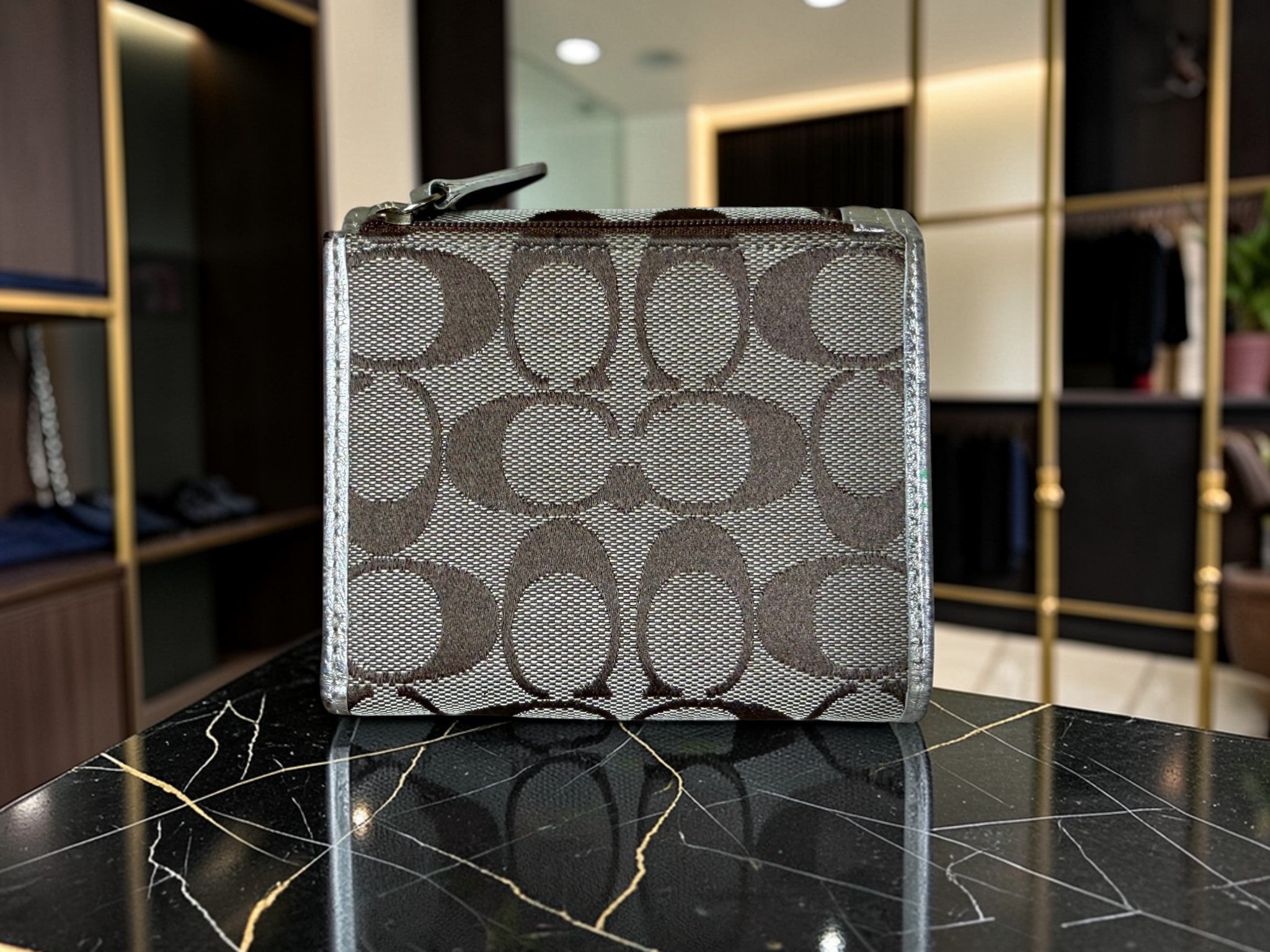 Coach Signature Metallic-goldfarbene Geldbörse mit Drehverschluss