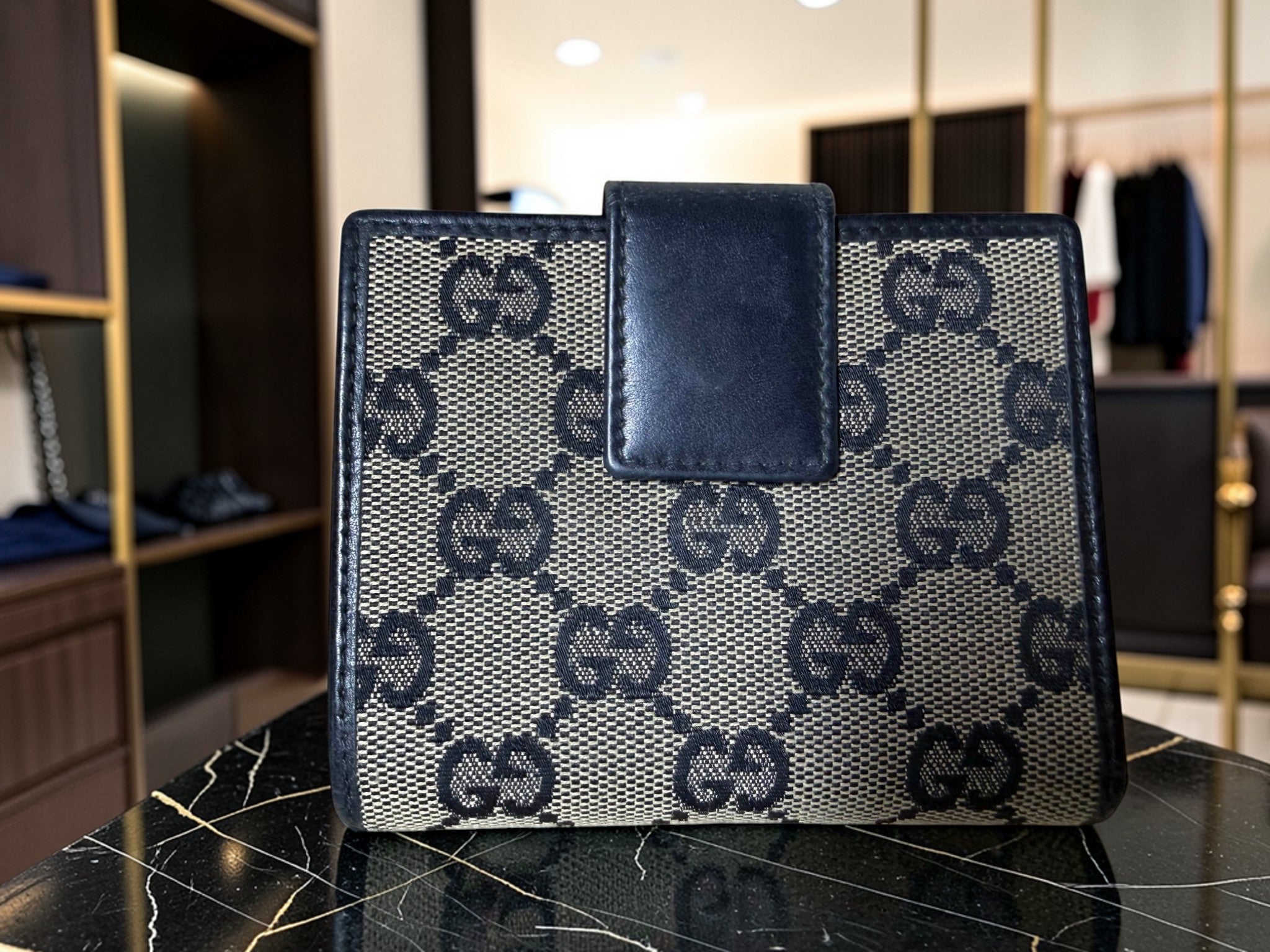 Gucci GG Supreme Canvas Geldbörse mit schwarzem Lederbesatz