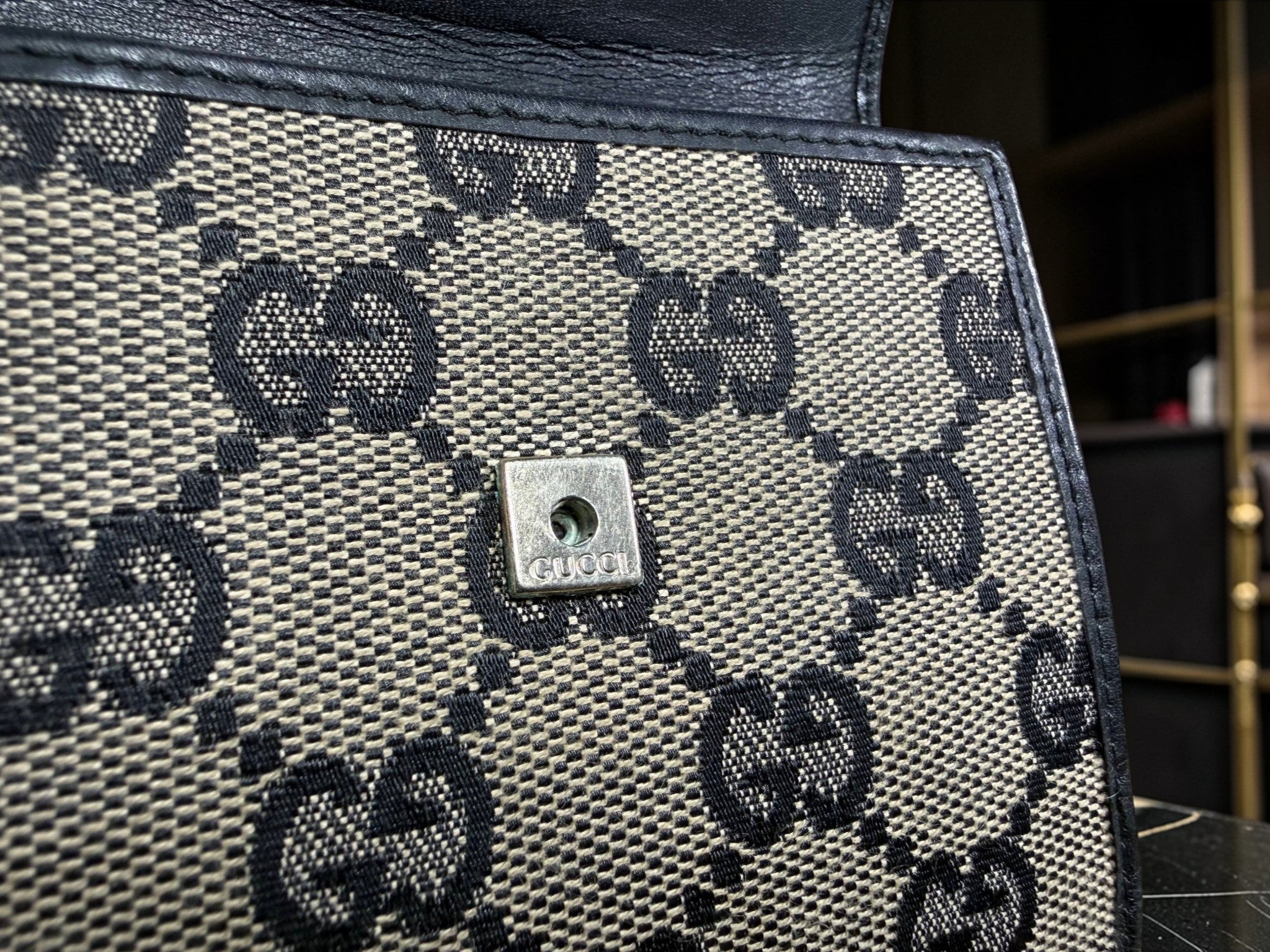 Gucci GG Supreme Canvas Geldbörse mit schwarzem Lederbesatz