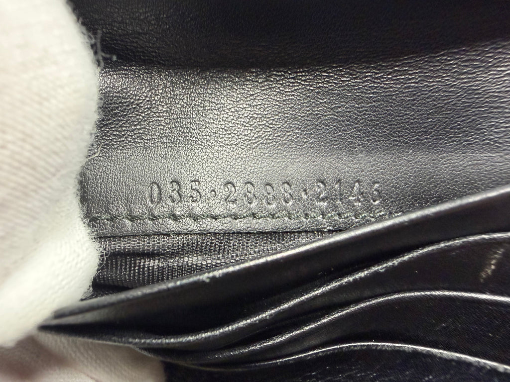 Gucci GG Supreme Canvas Bifold Wallet with Black Leather Trim