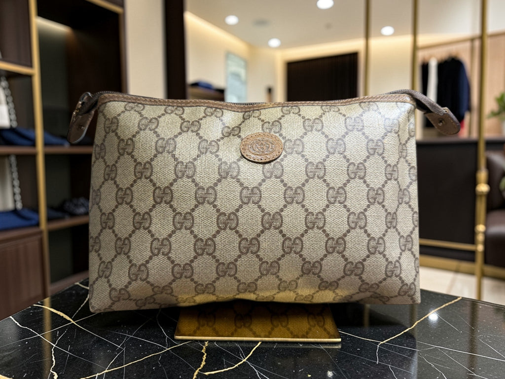 Trousse de toilette / Pochette à cosmétiques vintage Gucci en toile monogrammée GG