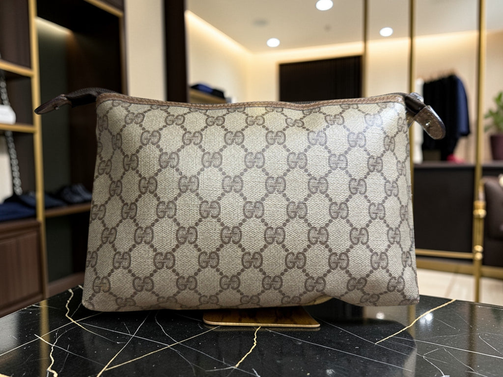Trousse de toilette / Pochette à cosmétiques vintage Gucci en toile monogrammée GG