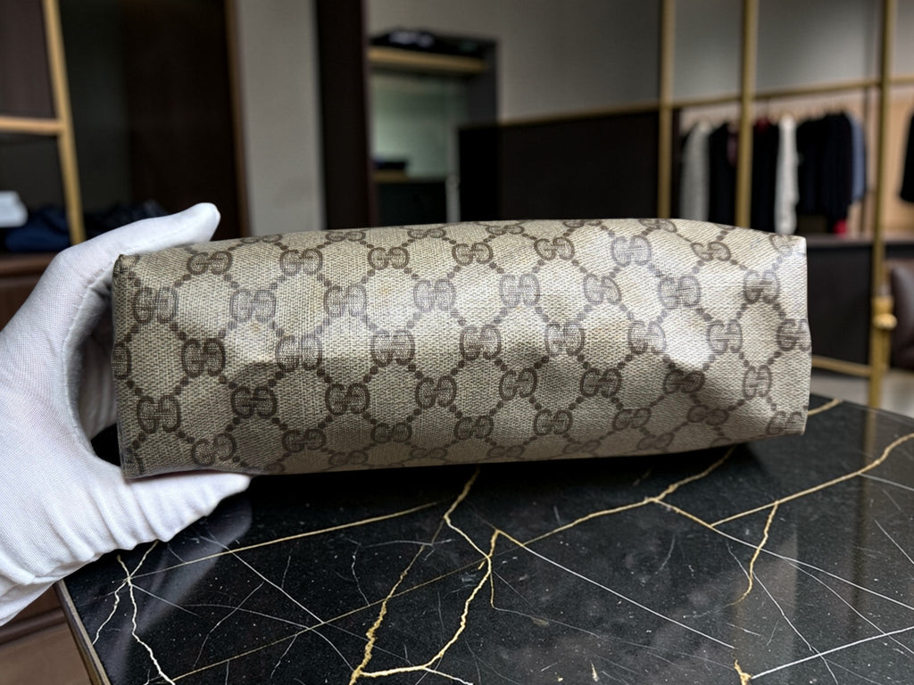 Trousse de toilette / Pochette à cosmétiques vintage Gucci en toile monogrammée GG