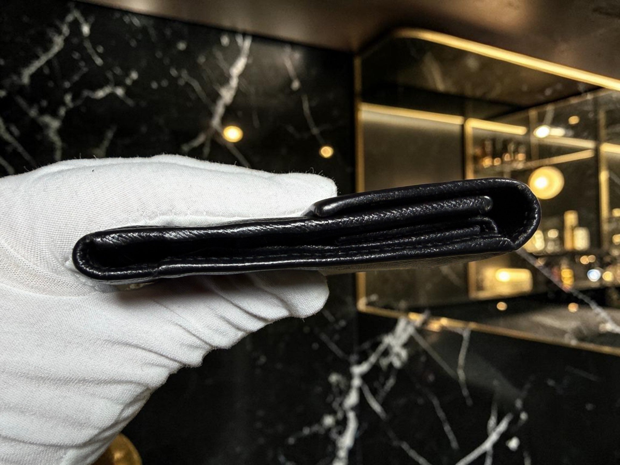 Prada Saffiano Leather Flap Wallet in Black