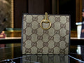 Vintage Gucci GG Supreme Horsebit Bifold Wallet – Beige Canvas with Brown Leather