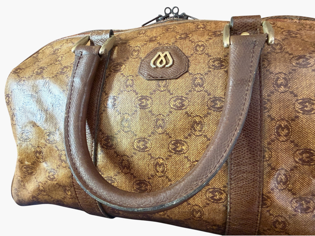Morabito monogram duffle bag, handle and crest detail
