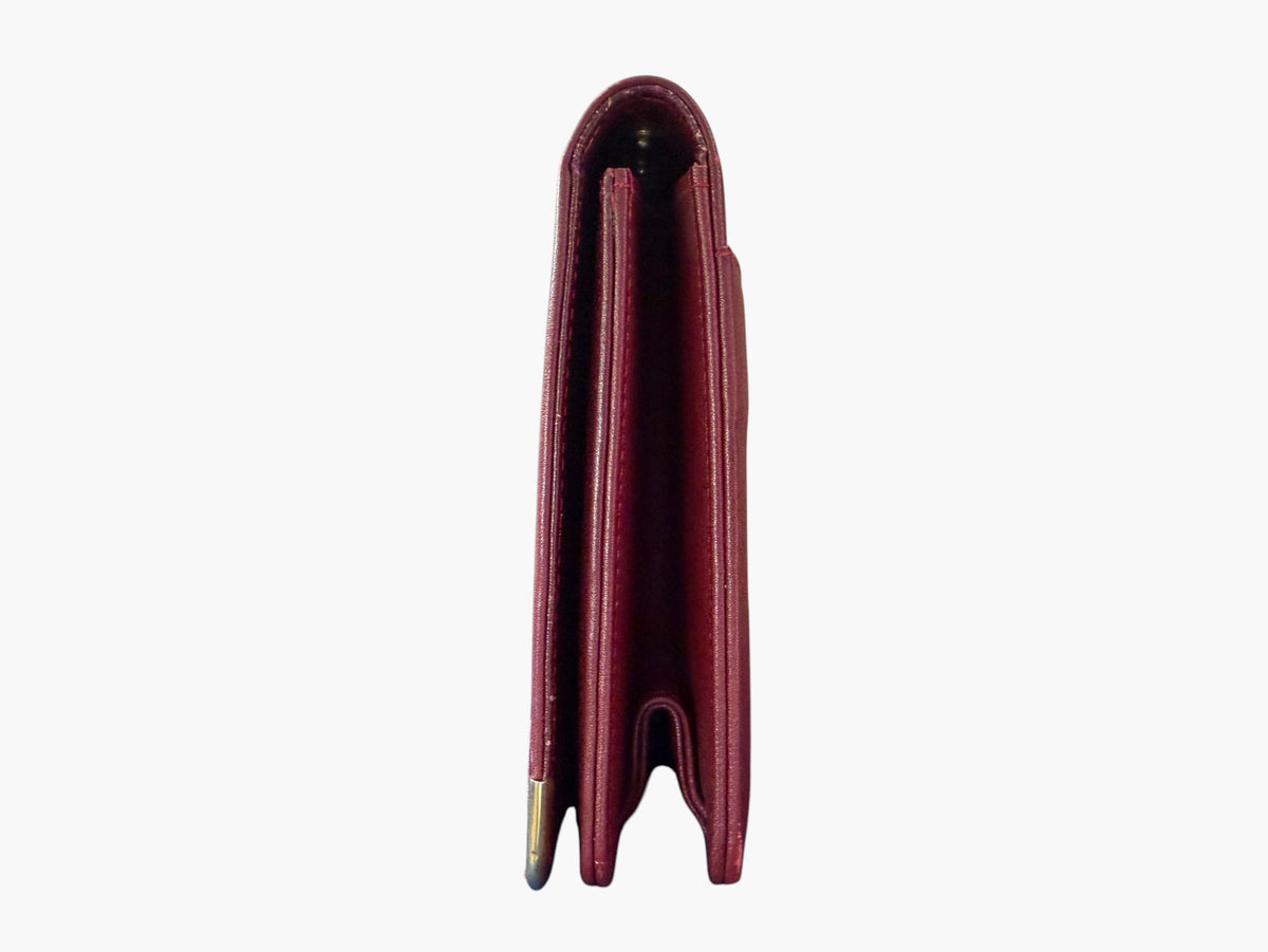 Cartier Must de Cartier clutch standing upright, side view