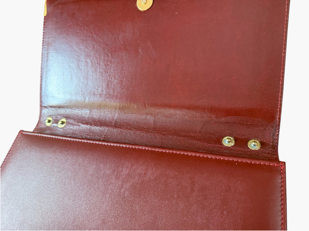 Vintage Cartier Must de Cartier burgundy leather clutch, detail view