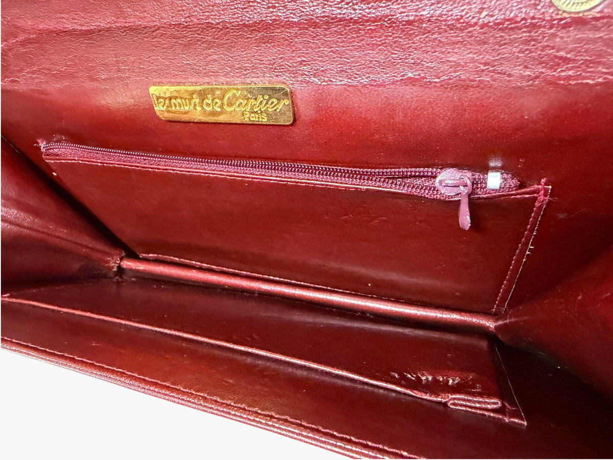 Interior zip pocket of Cartier Must de Cartier clutch