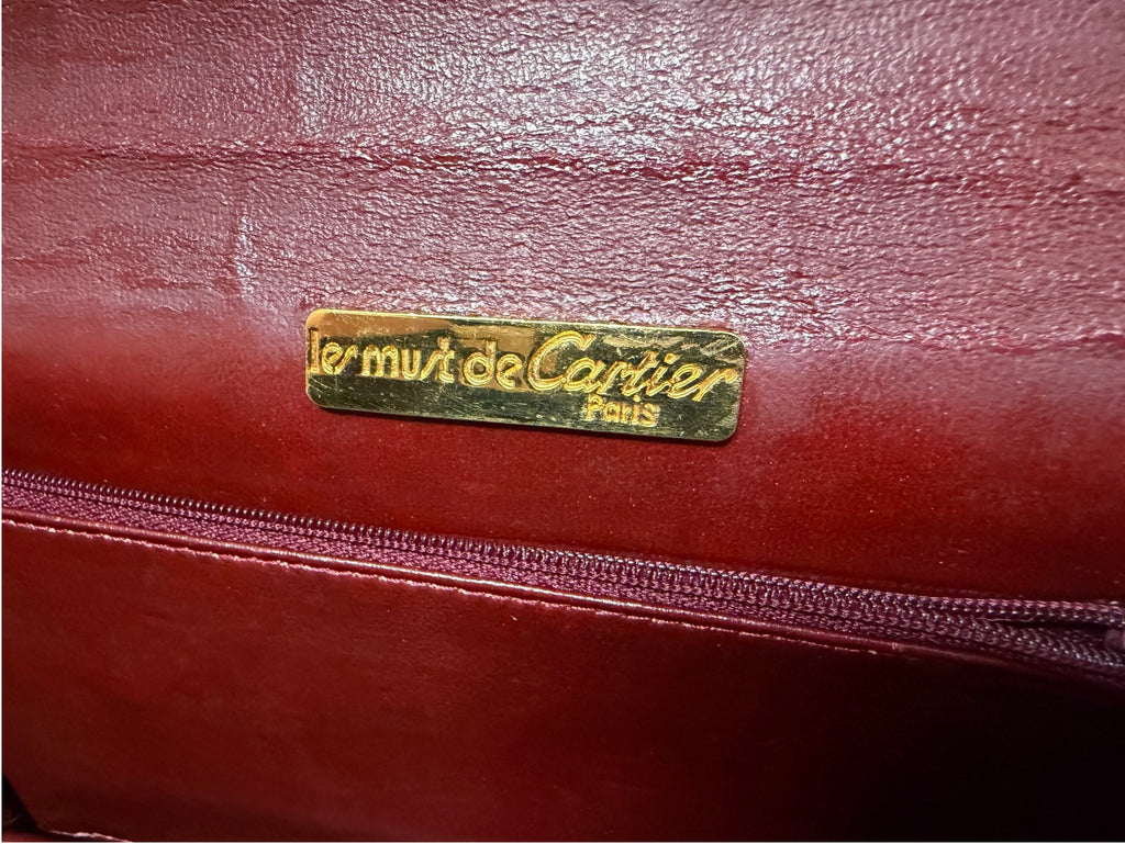 Le Must de Cartier Paris label inside the clutch