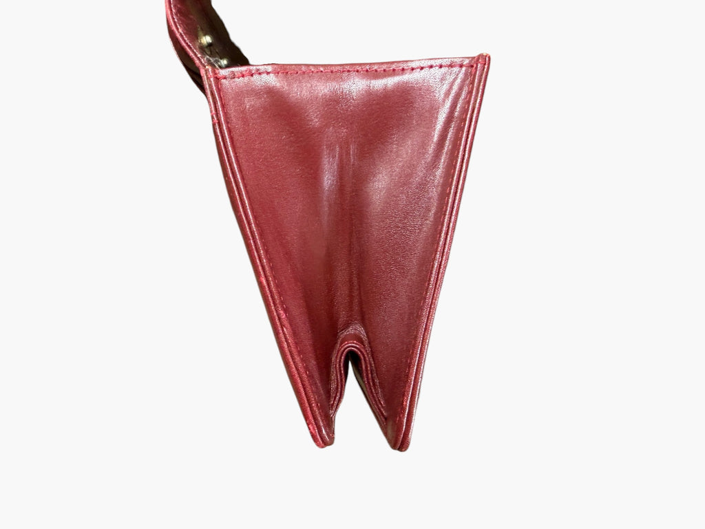 Cartier Must de Cartier clutch base and corner detail