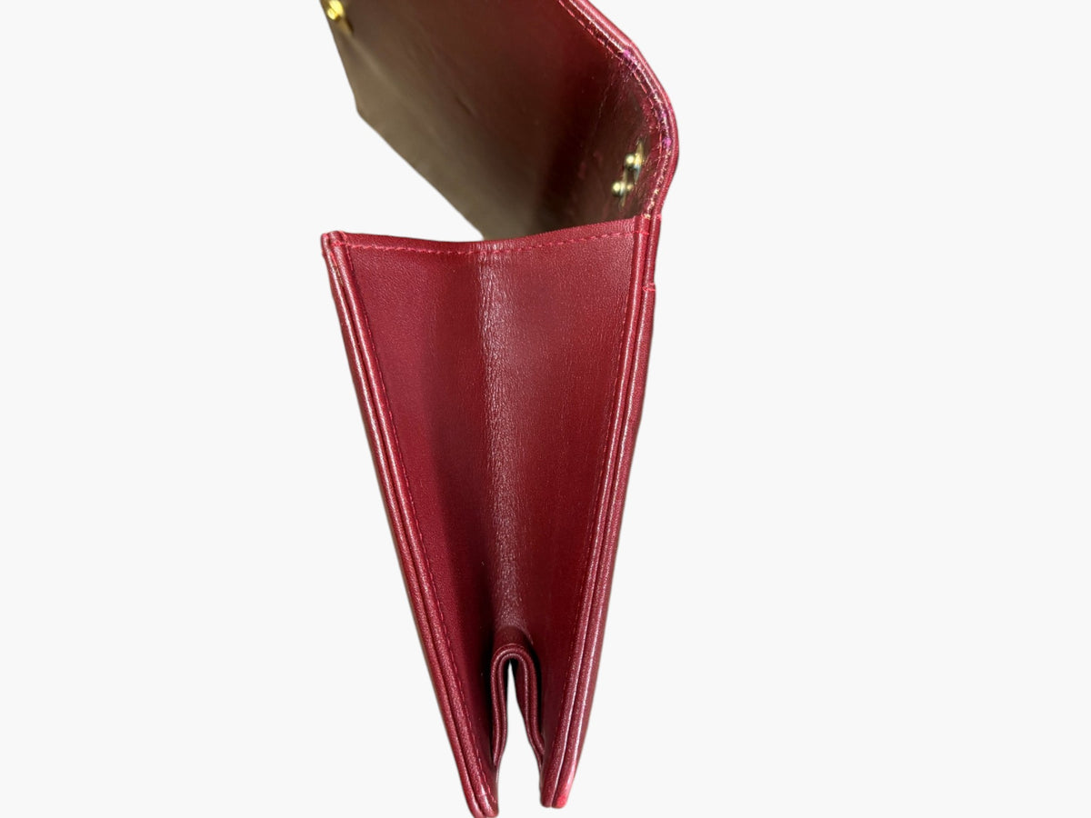 Vintage Cartier Must de Cartier burgundy leather clutch, detail view