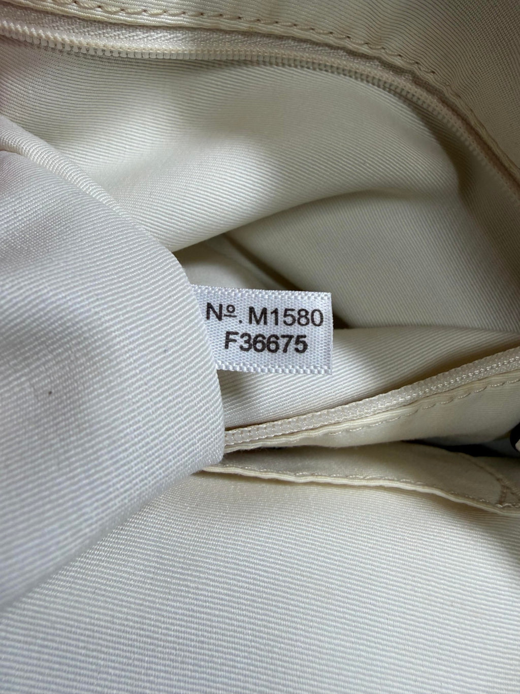 Sac cabas zippé City en cuir grainé blanc cassé Coach