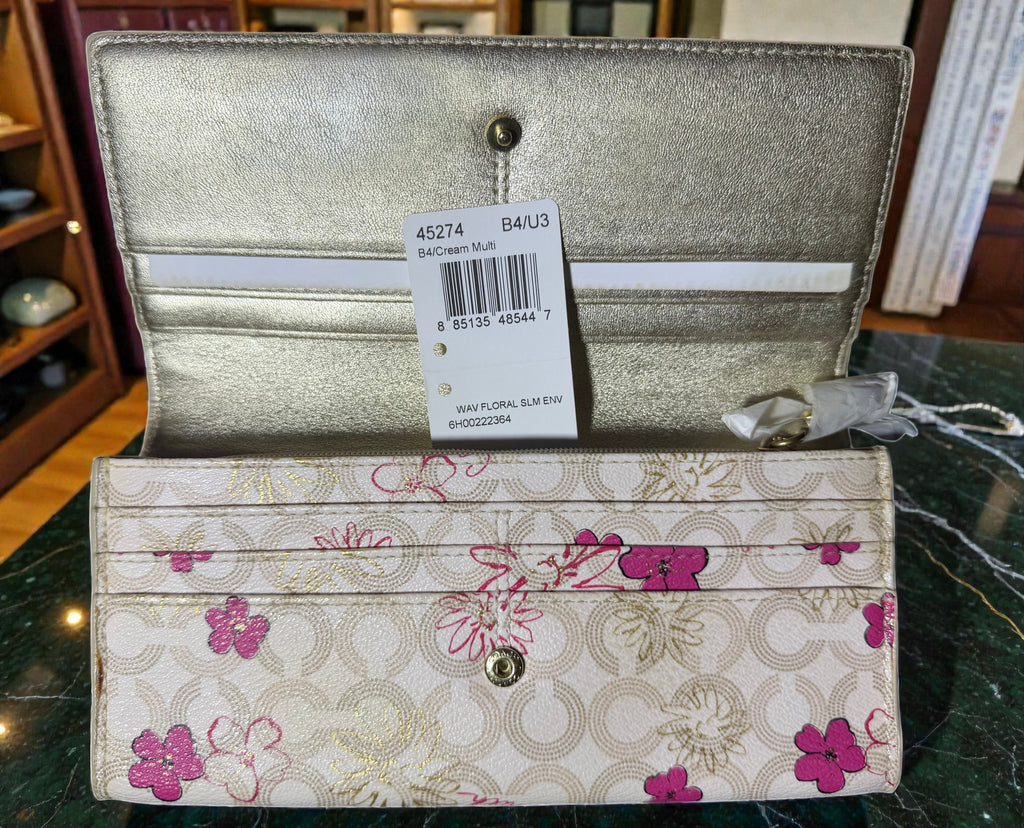 Coach Waverly Portemonnaie aus floralem Leder