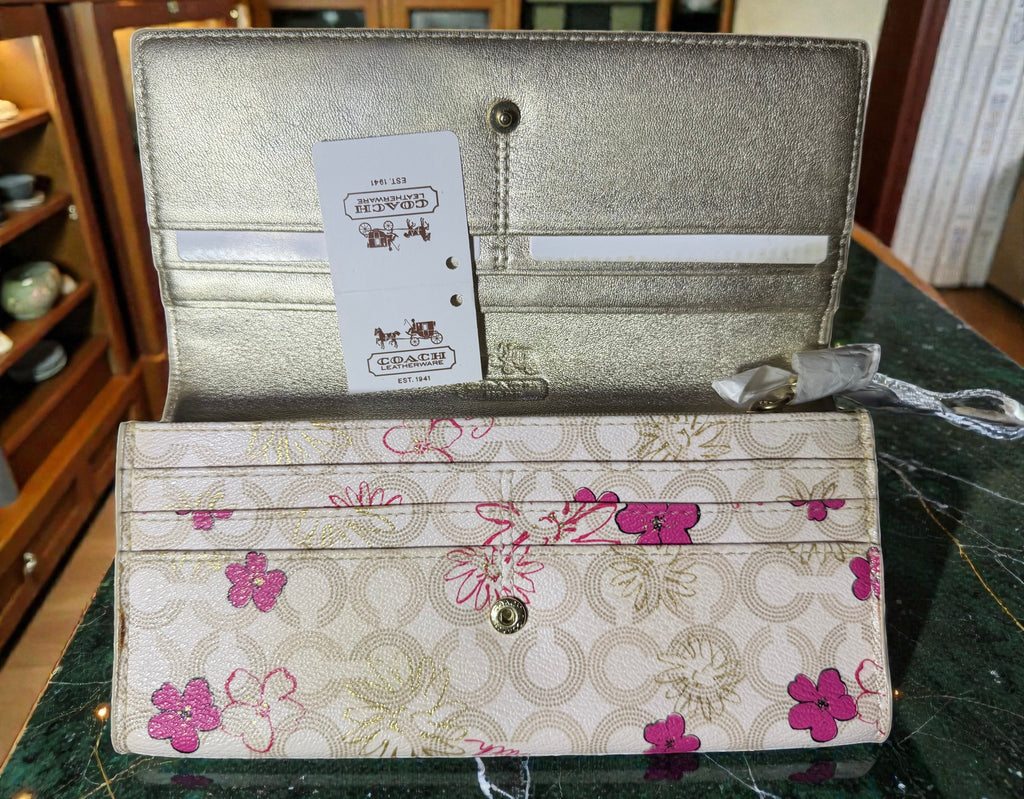 Coach Waverly Portemonnaie aus floralem Leder