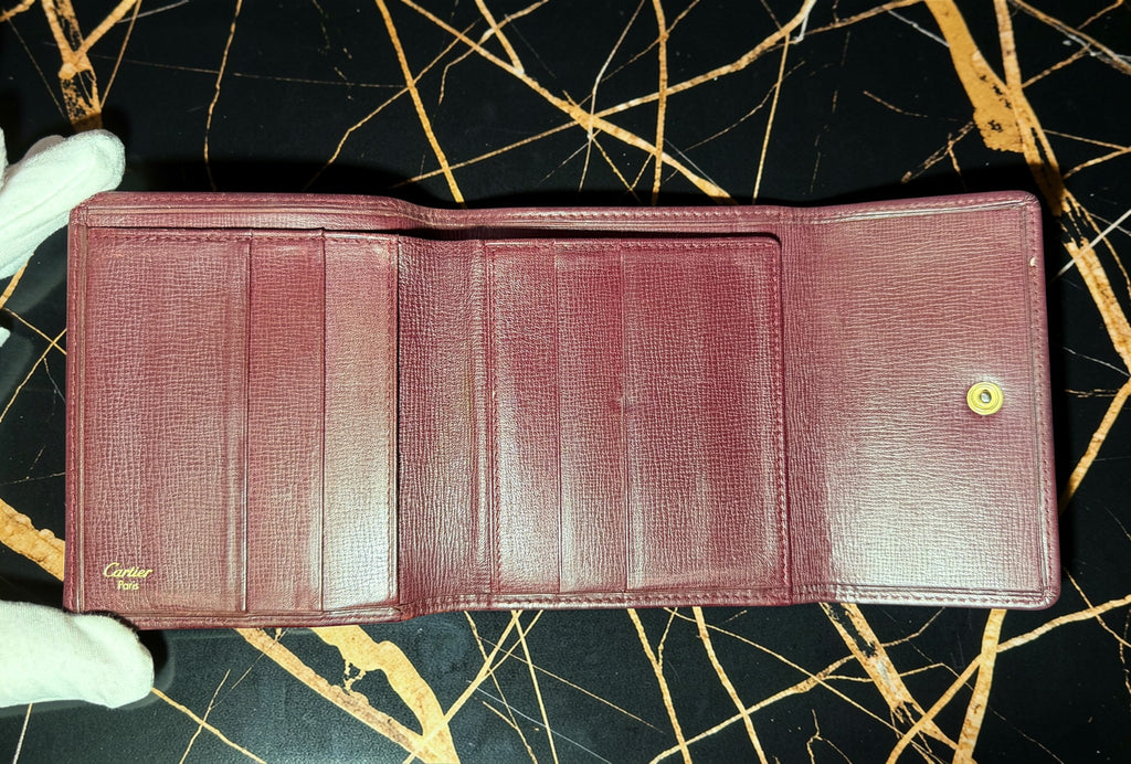 Portefeuille compact à trois volets Cartier Must de Cartier
