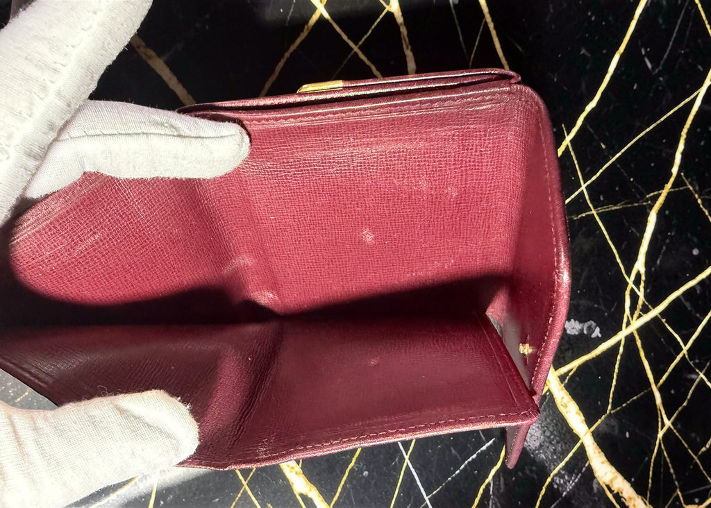 Portefeuille compact à trois volets Cartier Must de Cartier