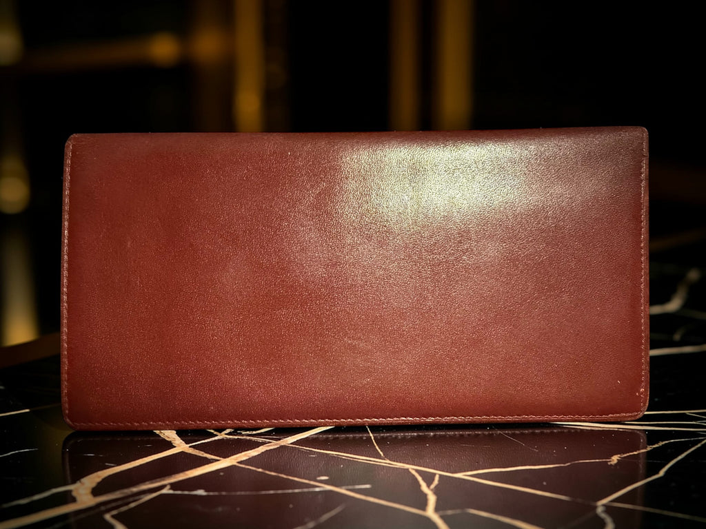 Portefeuille long Must de Cartier en cuir de veau