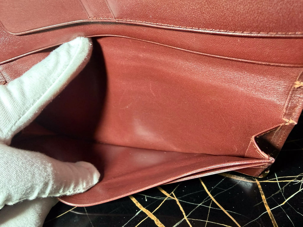 Portefeuille long Must de Cartier en cuir de veau